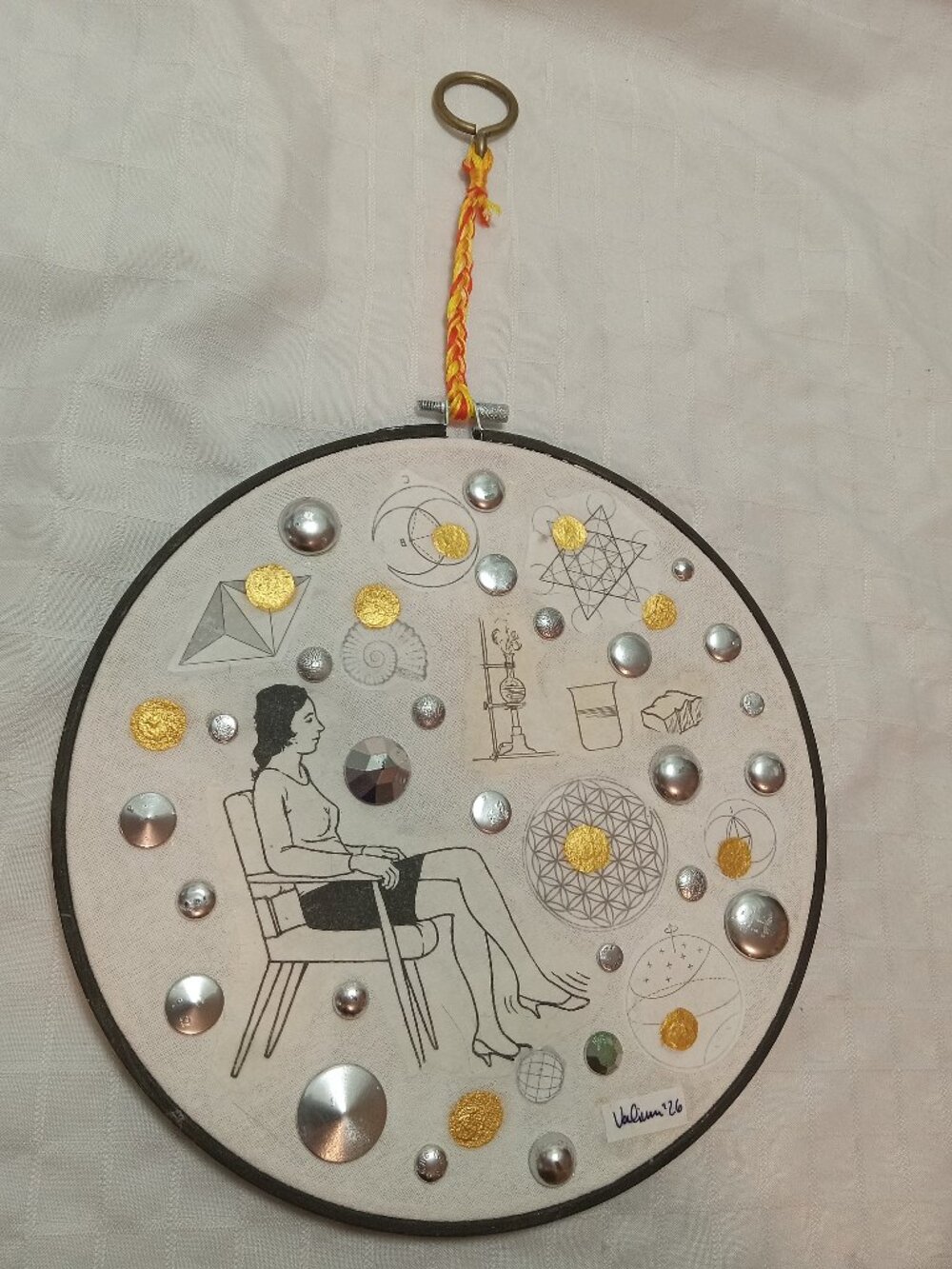 Handmade prints of old magazines on cotton & mixed media in a cross-stitch hoop